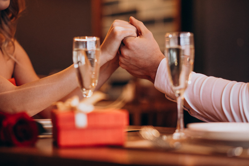 couple-holding-hands-valentines-evening-restaurant (1).jpg couple-holding-hands-valentines-evening-restaurant (1).jpg